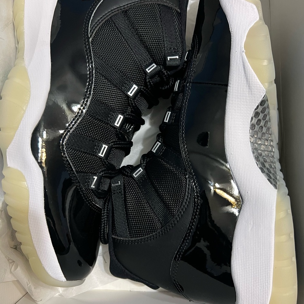 Jordan 11 Retro Men's Black and White Athletic Shoes